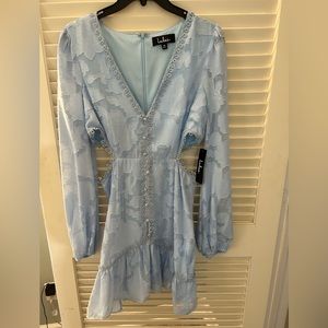 Brand new mini dress with side cut outs